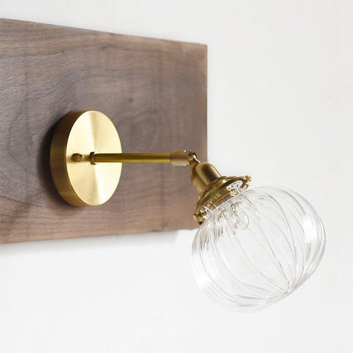 Anemone swirled glass brass wall light sconce.