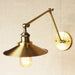 Brass Cone Shade Wall Light With Long Arm.