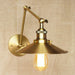 Brass Cone Shade Wall Light With Long Arm.