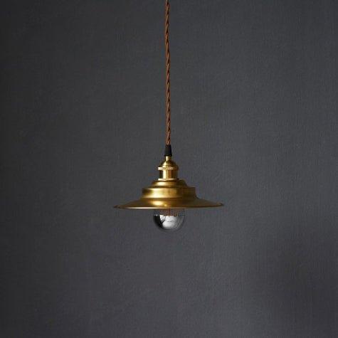 Cedric gold industrial pendant light.