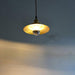 Cedric gold industrial pendant light.