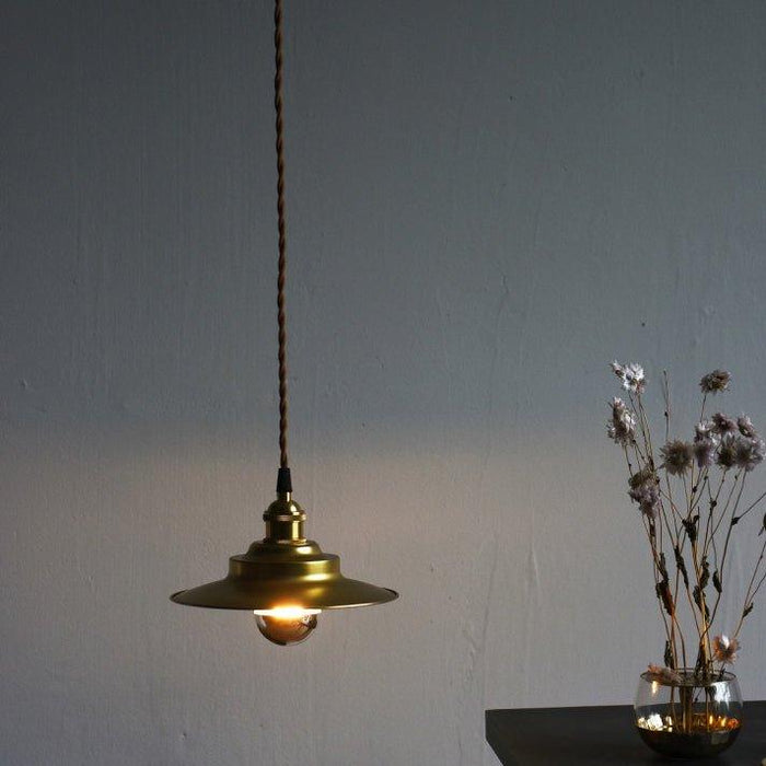 Cedric gold industrial pendant light.