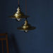 Cedric gold industrial pendant light.