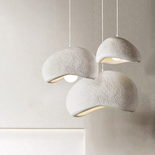 Stucco textured pebble stone plaster pendant light.