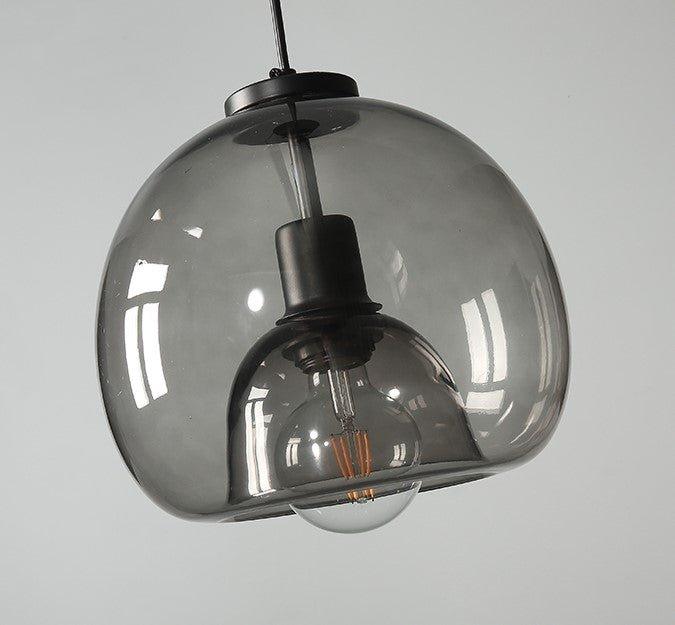 Enzo minimalist curve tinted glass shade pendant light.