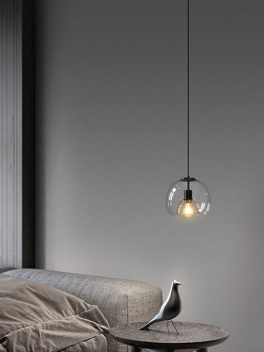 Enzo minimalist curve tinted glass shade pendant light.