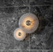 Moonshade Natural Marble Disc Wall Sconce.